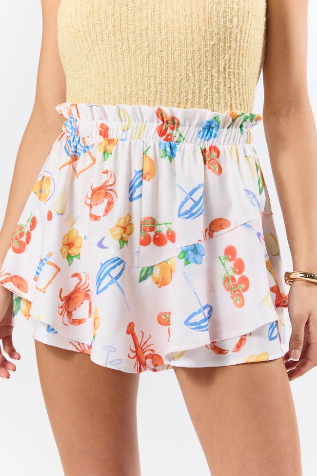 Summer Mirage Ivory Icon Print Ruffle Hem Shorts - ShopLorca